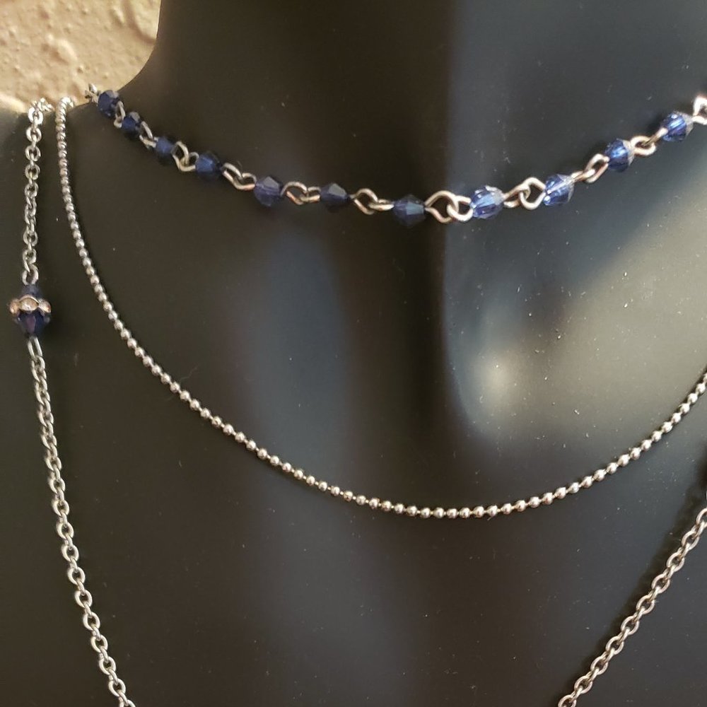 Silver necklace with sapphires and matching earrings